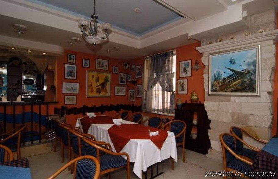 Mesogios Hotel Kisinyov Étterem fotó